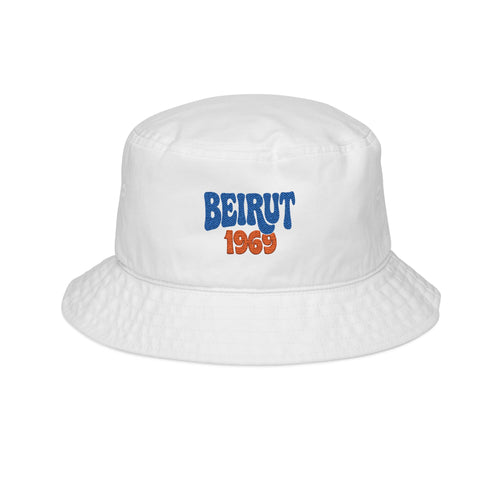 White Monani bucket hat with blue and orange Beirut 1969 lettering