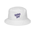 White Monani bucket hat with purple Hayni Jay lettering