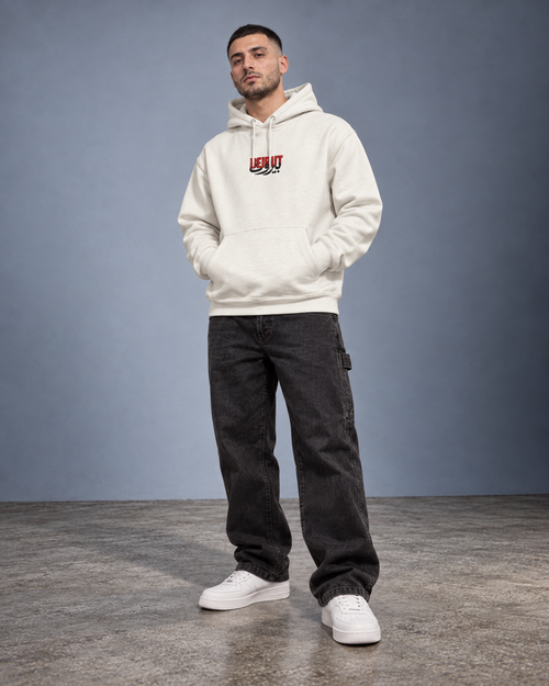 Model wearing the ivory Monani Beirut Hoodie, front studio view