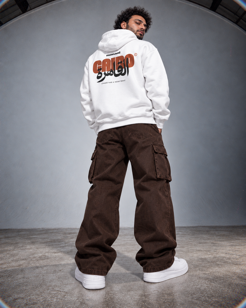Model wearing the Monani Cairo white hoodie, back view
