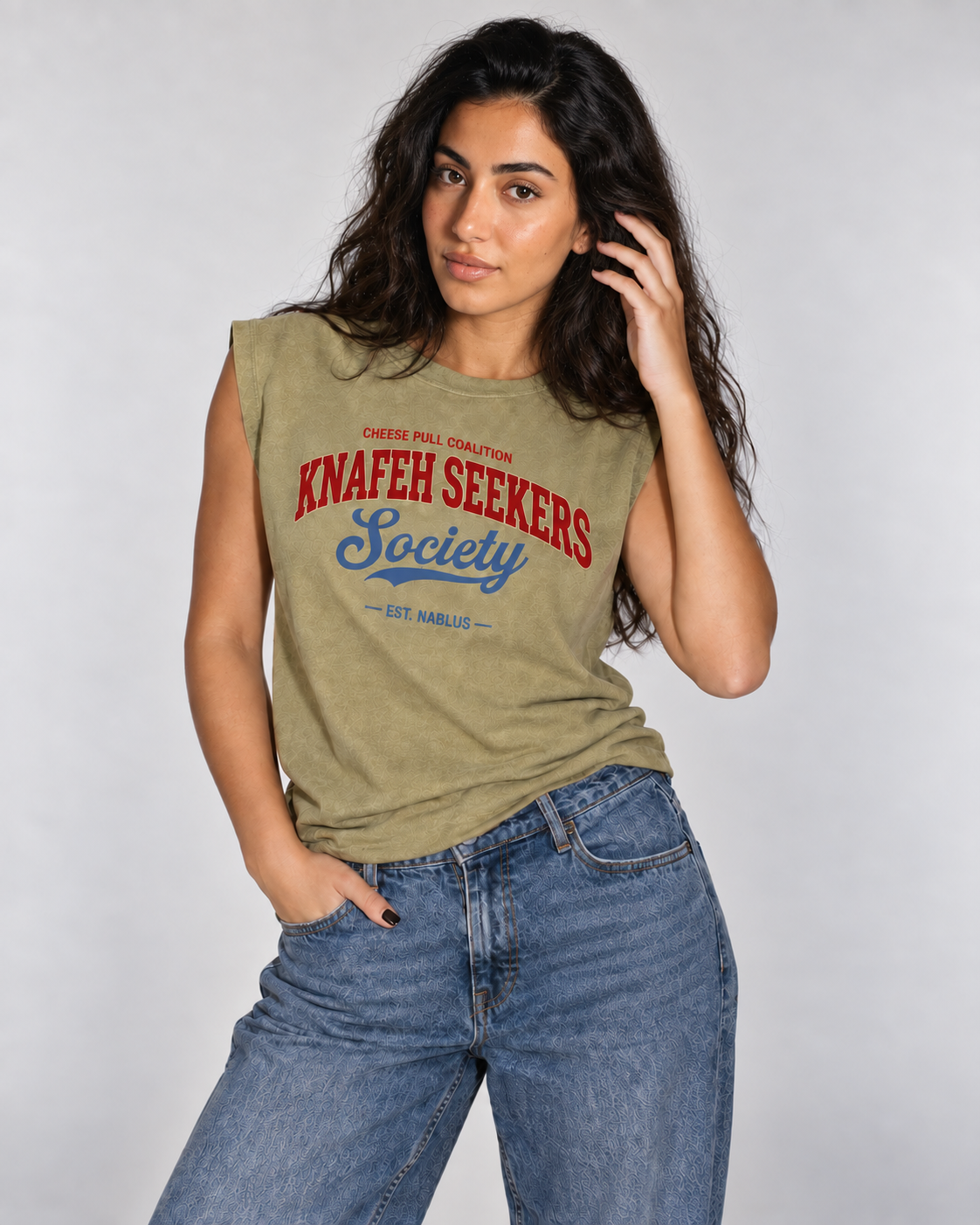 Model wearing the Monani Knafeh Seekers Society olive muscle tee, portrait view