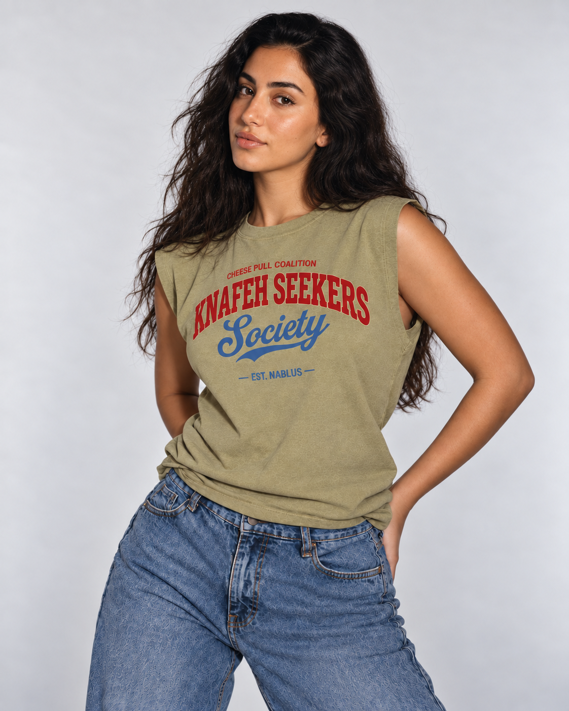Model wearing the Monani Knafeh Seekers Society olive muscle tee, standing view